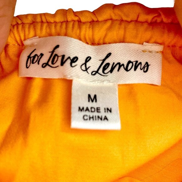 FOR LOVE & LEMONS Clementine Ruffled Tie Back Mini Dress Orange - Picture 7 of 14